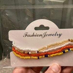 Set of 4 Stretchy anklets.  NWT.. handmade.